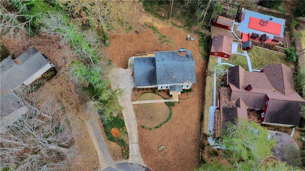 1610 Old Mill Crossing Northeast Marietta, GA 30062 - Photo 41 of 55 an aerial view of residential houses with outdoor space and street view