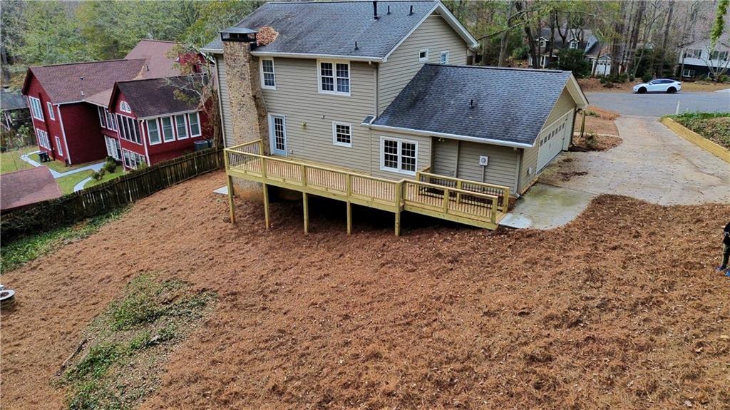 1610 Old Mill Crossing Northeast Marietta, GA 30062 - Photo 45 of 55 an aerial view of residential houses with yard and trees