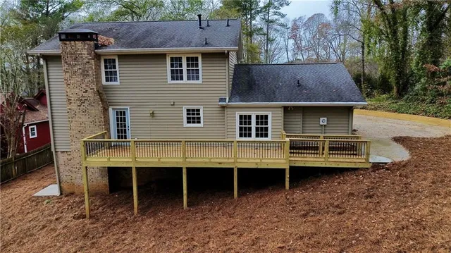 an aerial view of multiple houses with outdoor space