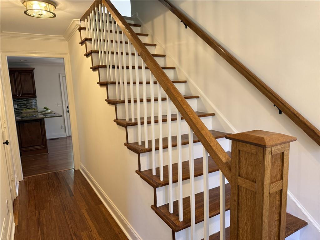 1610 Old Mill Crossing Northeast Marietta, GA 30062 - Photo 8 of 55 a view of entryway with wooden floor and stairs