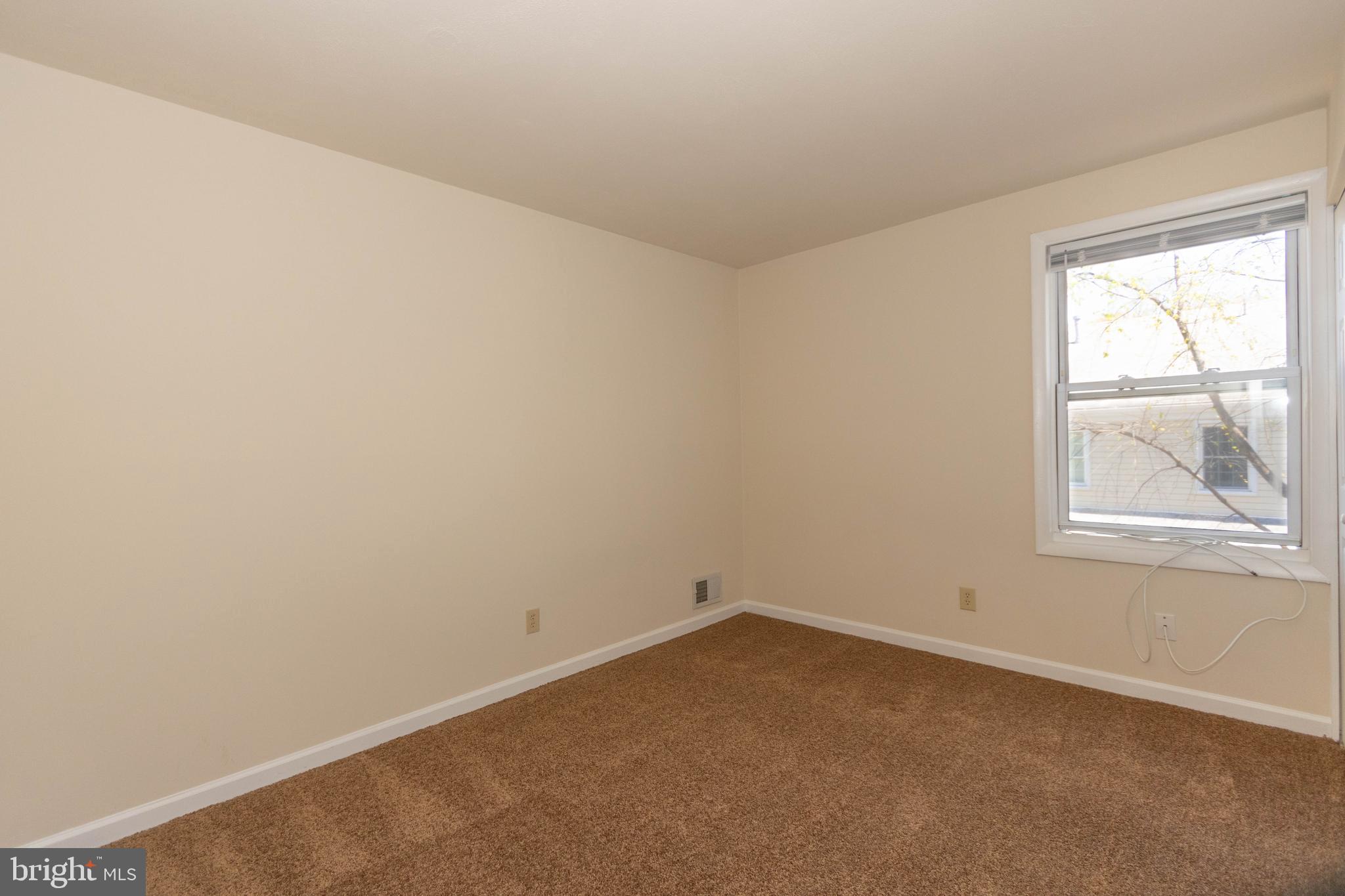 9206 Hood Road Manassas, VA 20110 - Photo 12 of 25 an empty room with a window