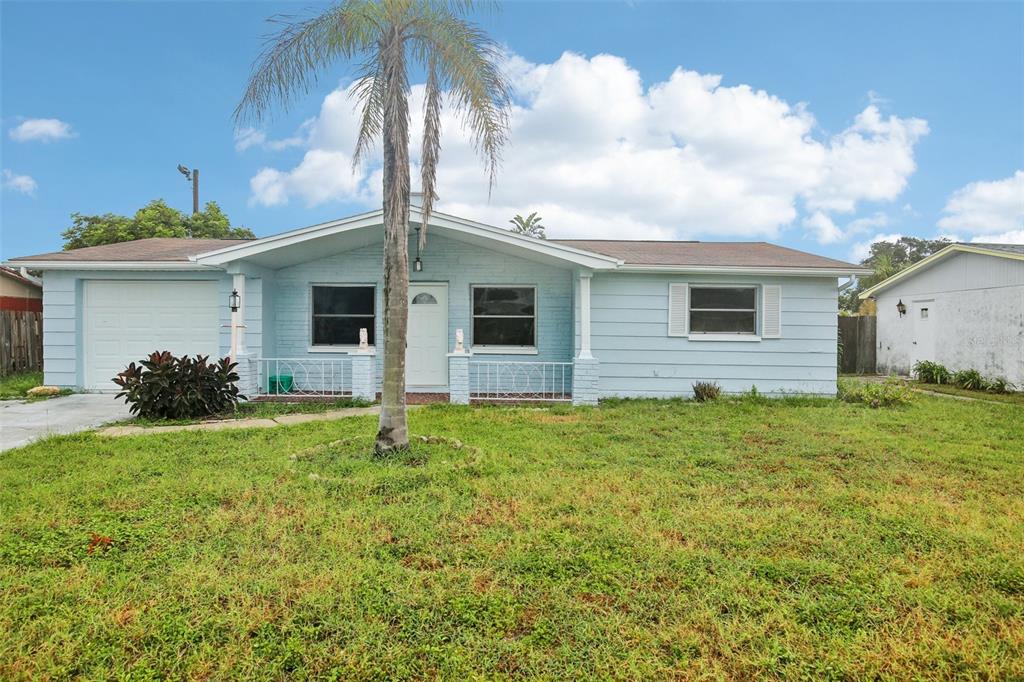 3235 Huntington Road Holiday, FL 34691 - Photo 1 of 1 a view of a house with backyard