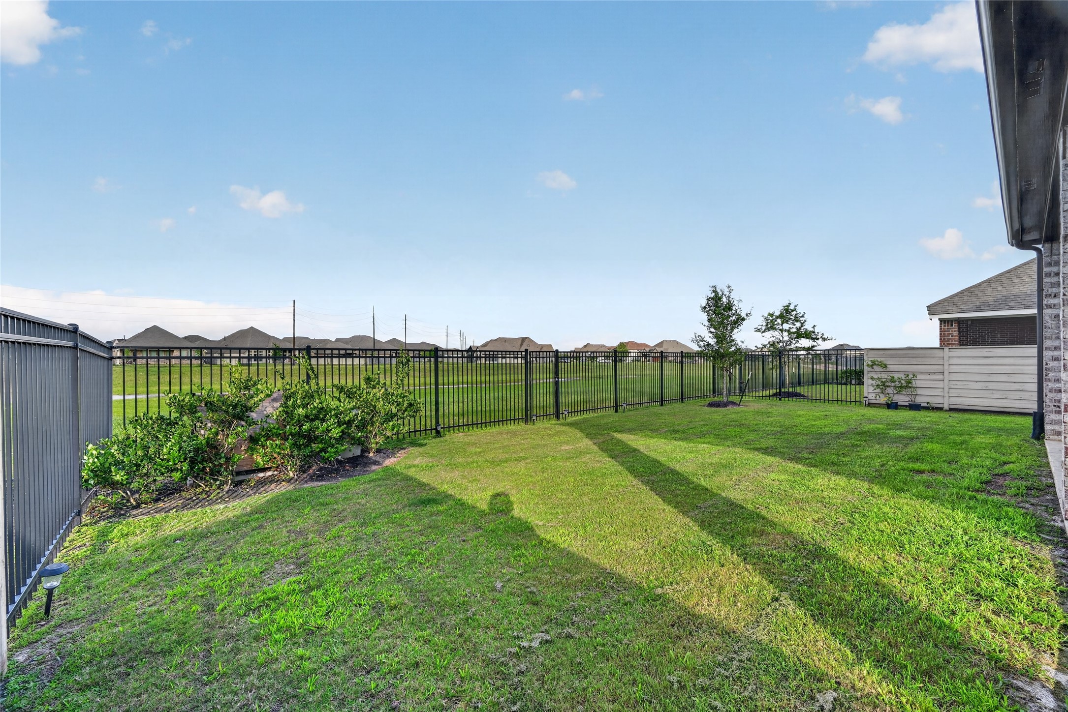 4439 Stone Ridge Lane Manvel, TX 77578 - Photo 48 of 48 a view of an outdoor space and a yard