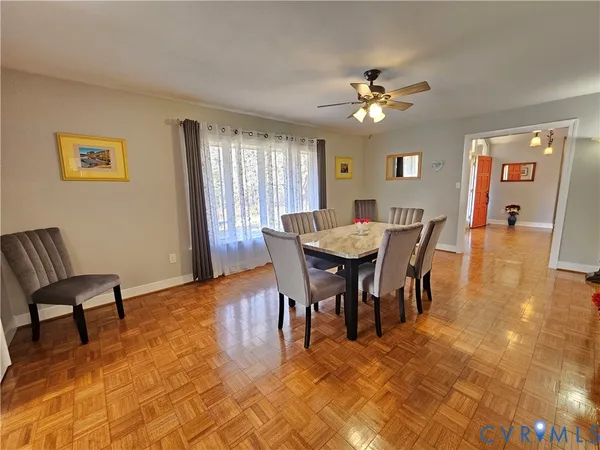a view of a dining room with furniture