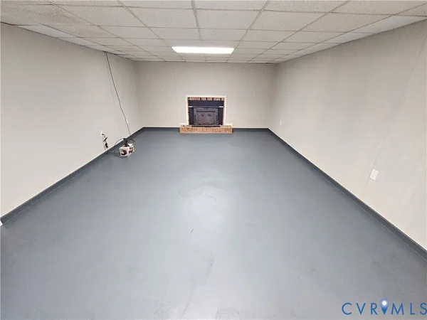 a view of a room with wooden walls