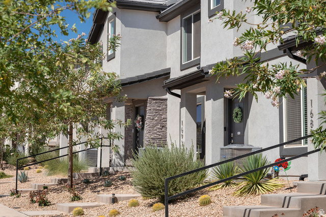 1693 Devils Gdn Lane Washington, UT 84780 - Photo 38 of 64 Contemporary stucco exteriors with dark trim accents