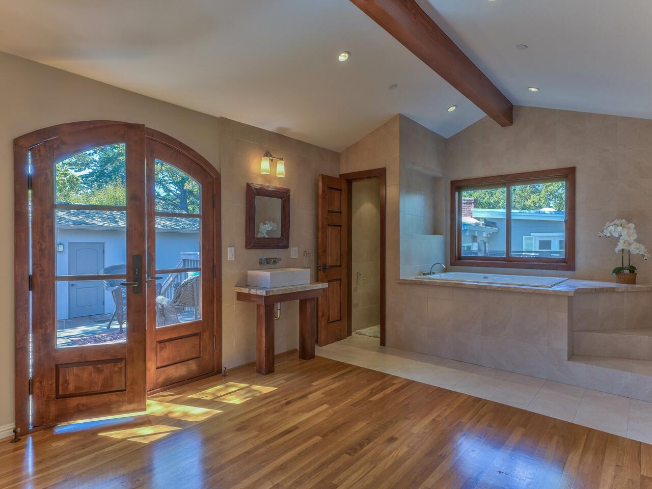 2 Perry Newberry Way Carmel, CA 93923 - Photo 17 of 30 a view of an empty room with window and wooden floor