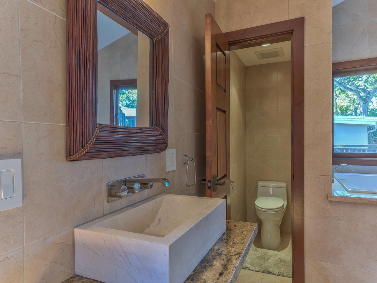 2 Perry Newberry Way Carmel, CA 93923 - Photo 20 of 30 a bathroom with a tub sink and a mirror