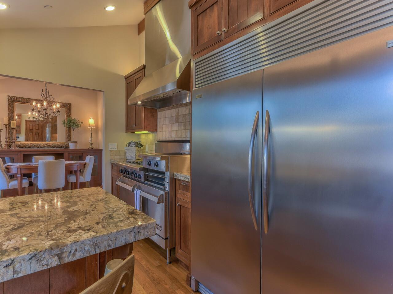 2 Perry Newberry Way Carmel, CA 93923 - Photo 5 of 30 a kitchen with kitchen island a counter top space cabinets stainless steel appliances and a counter top