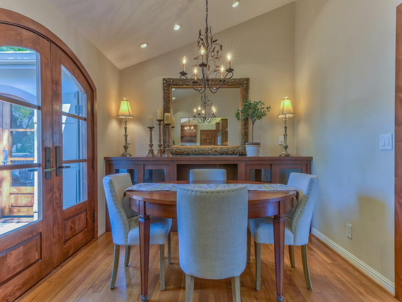 2 Perry Newberry Way Carmel, CA 93923 - Photo 8 of 30 a view of a dining room with furniture a chandelier and wooden floor