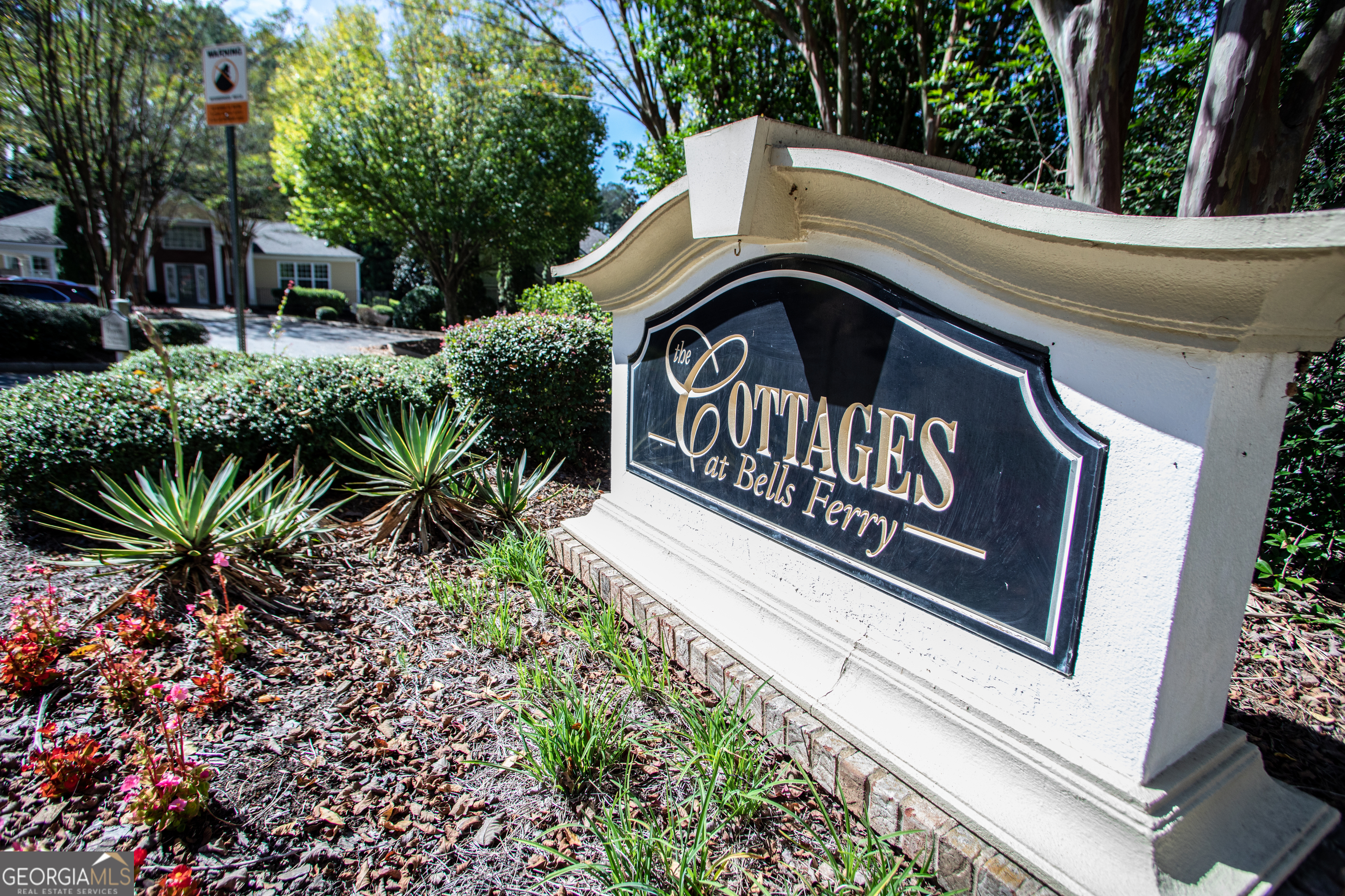 2367 Barrett Cottage PIace Marietta, GA 30066 - Photo 31 of 32 a view of a street sign of the house