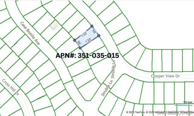 a bathroom with a shower curtain and a large window