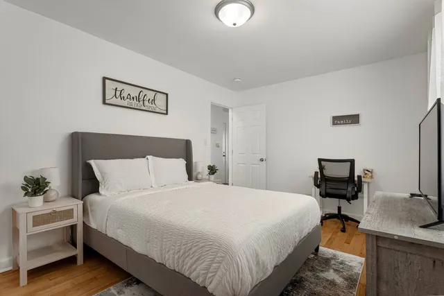 a bedroom with a bed and furniture