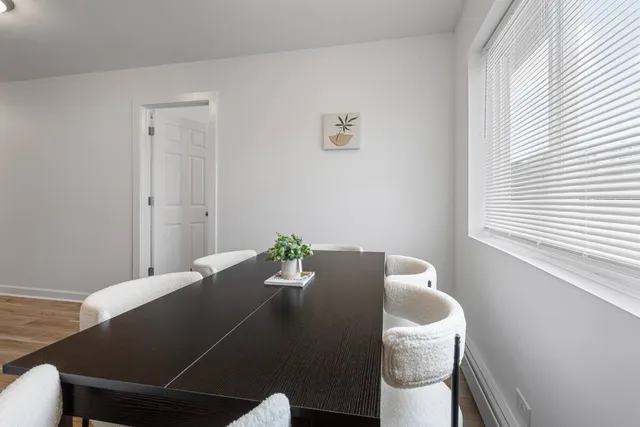 a workspace with furniture and window