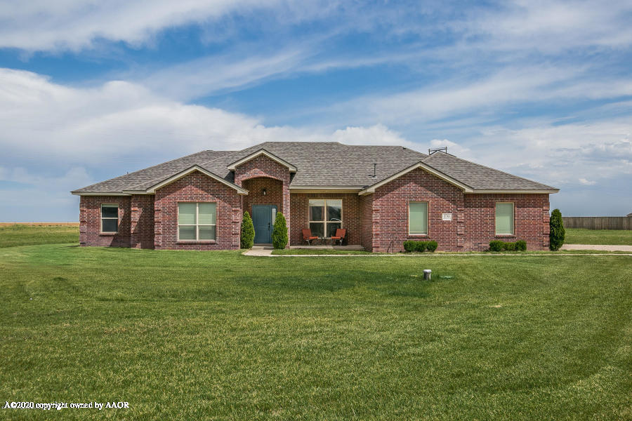 17701 Morning Star Road Amarillo, TX 79124 - Photo 1 of 10 a front view of a house with a yard
