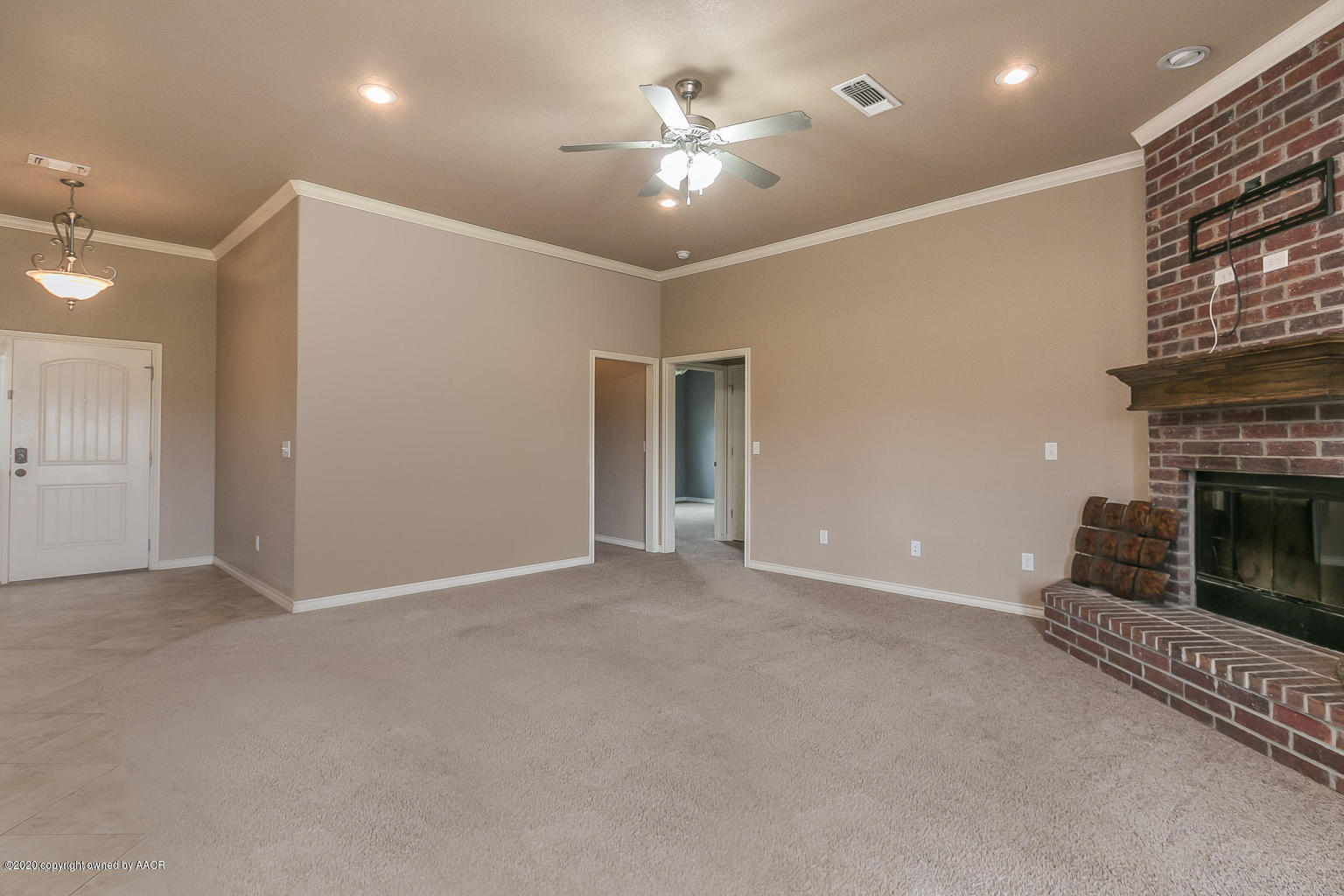 17701 Morning Star Road Amarillo, TX 79124 - Photo 7 of 10 a view of an empty room with a fireplace