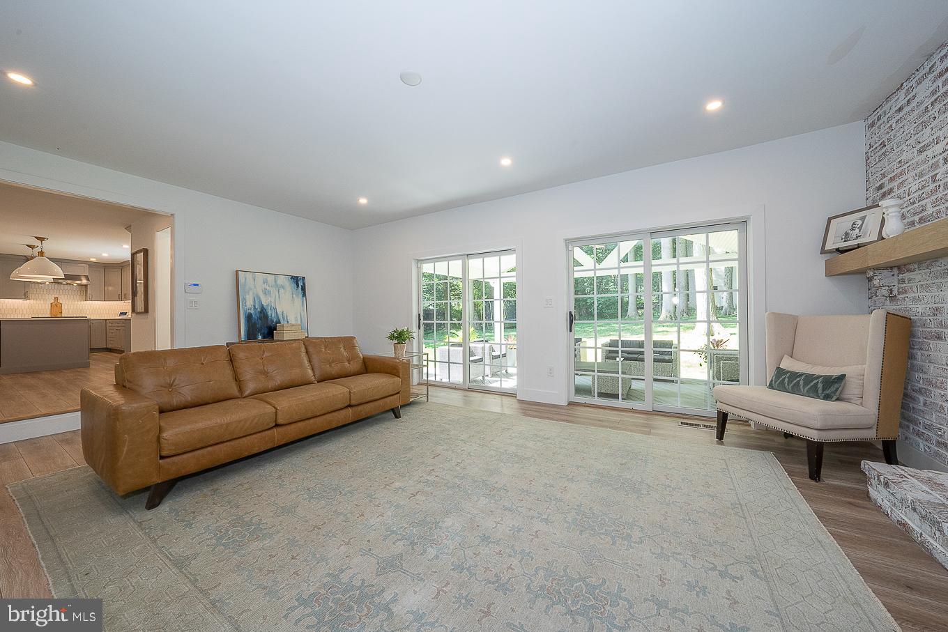 227 Autumn Drive Exton, PA 19341 - Photo 15 of 46 Family Room with Double Sliders to Covered Deck