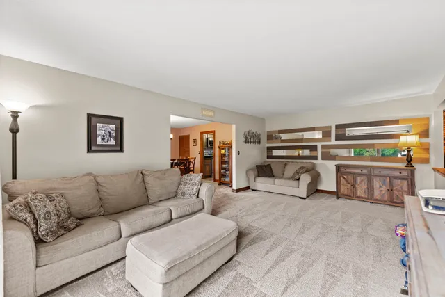 a living room with furniture and a couch