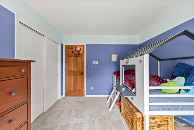 a view of entryway room and hall