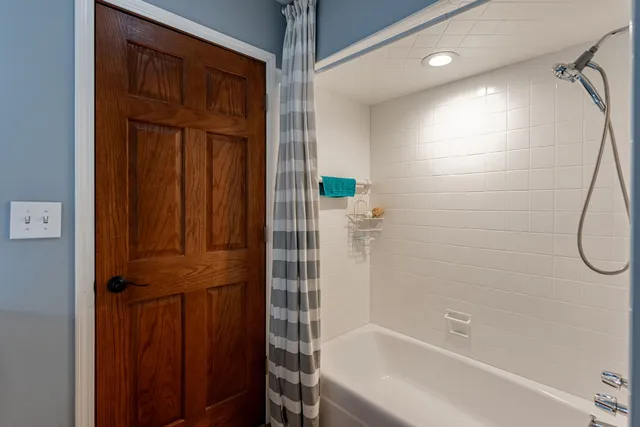 a bathroom with a bathtub