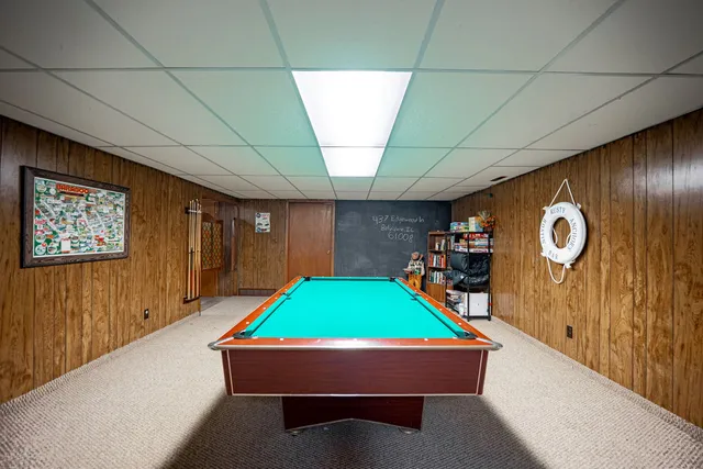 a room with toys and pool table