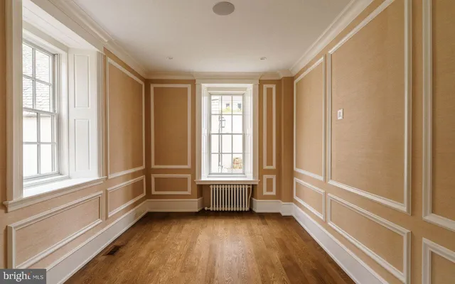 a view of entryway with wooden floor