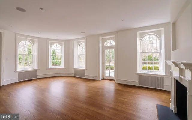 a kitchen with granite countertop a sink and a window