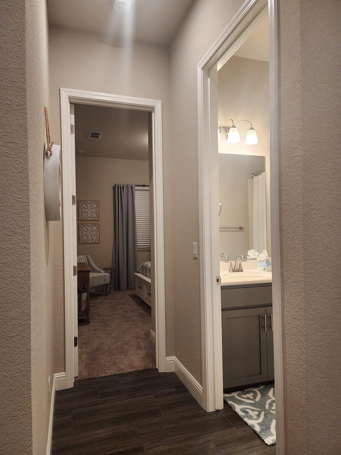 1820 Van Ruiten Drive Lodi, CA 95242 - Photo 21 of 32 Bedroom and hallway bathroom