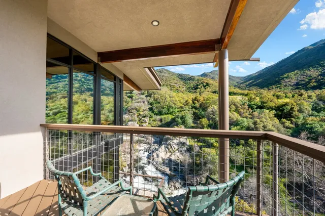 a view of a lush green mountain