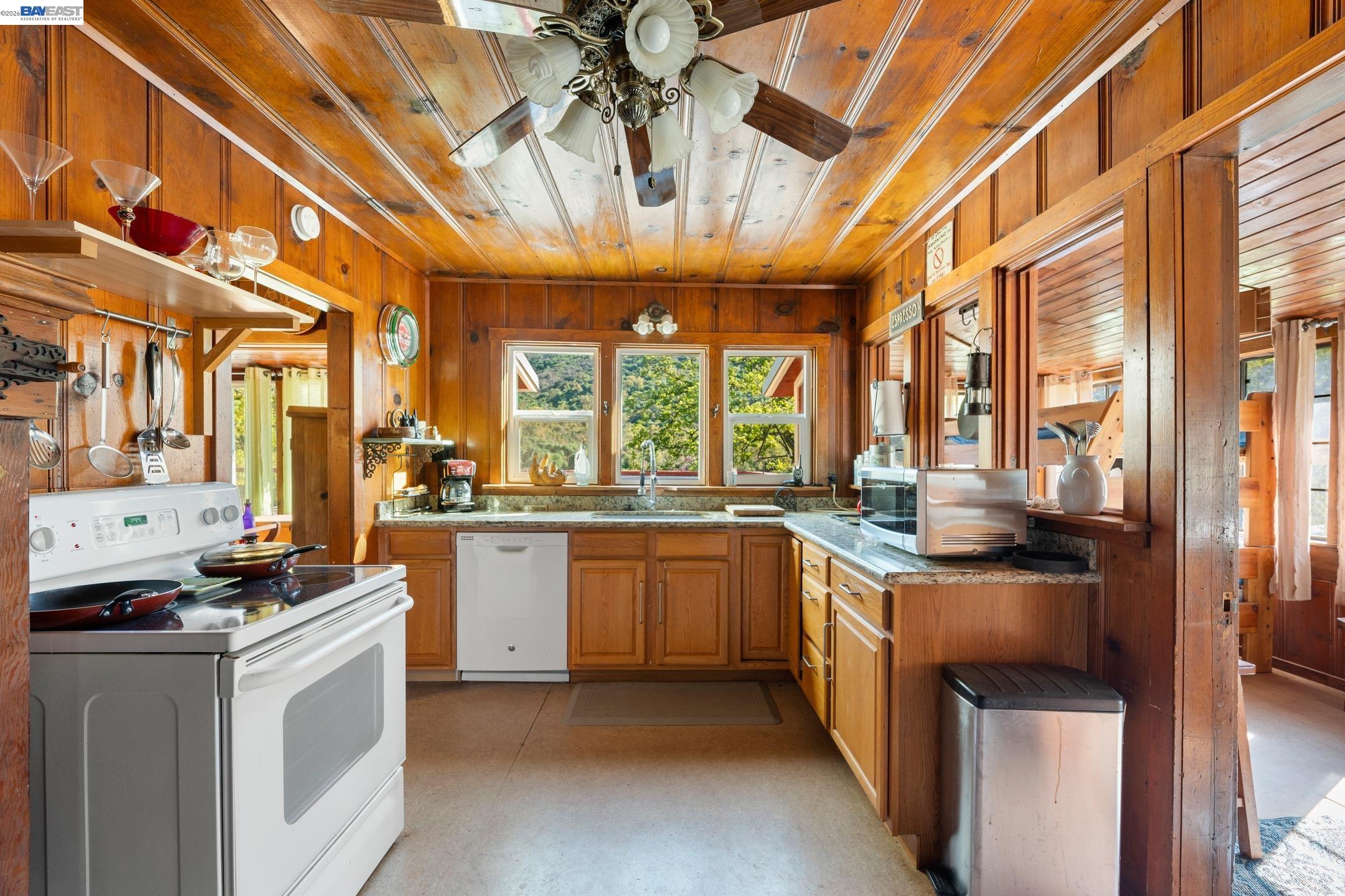 48250 South Fork Drive Three Rivers, CA 93271 - Photo 43 of 48 a kitchen with stainless steel appliances granite countertop a stove and a sink