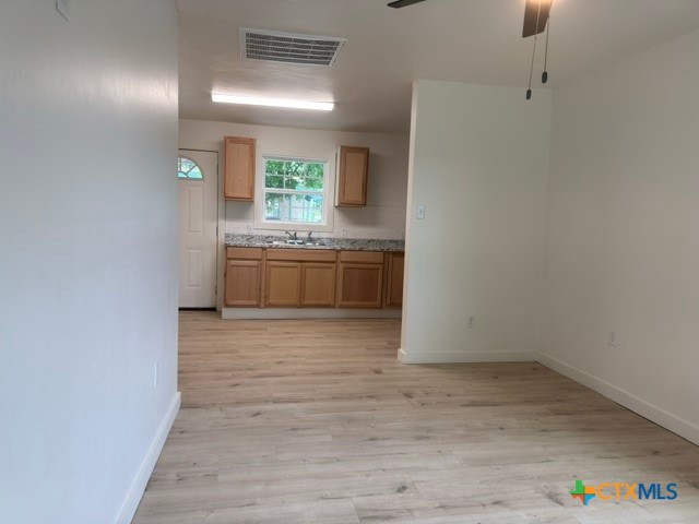 602 South 26th Street Temple, TX 76501 - Photo 5 of 11 a room with a sink and cabinets