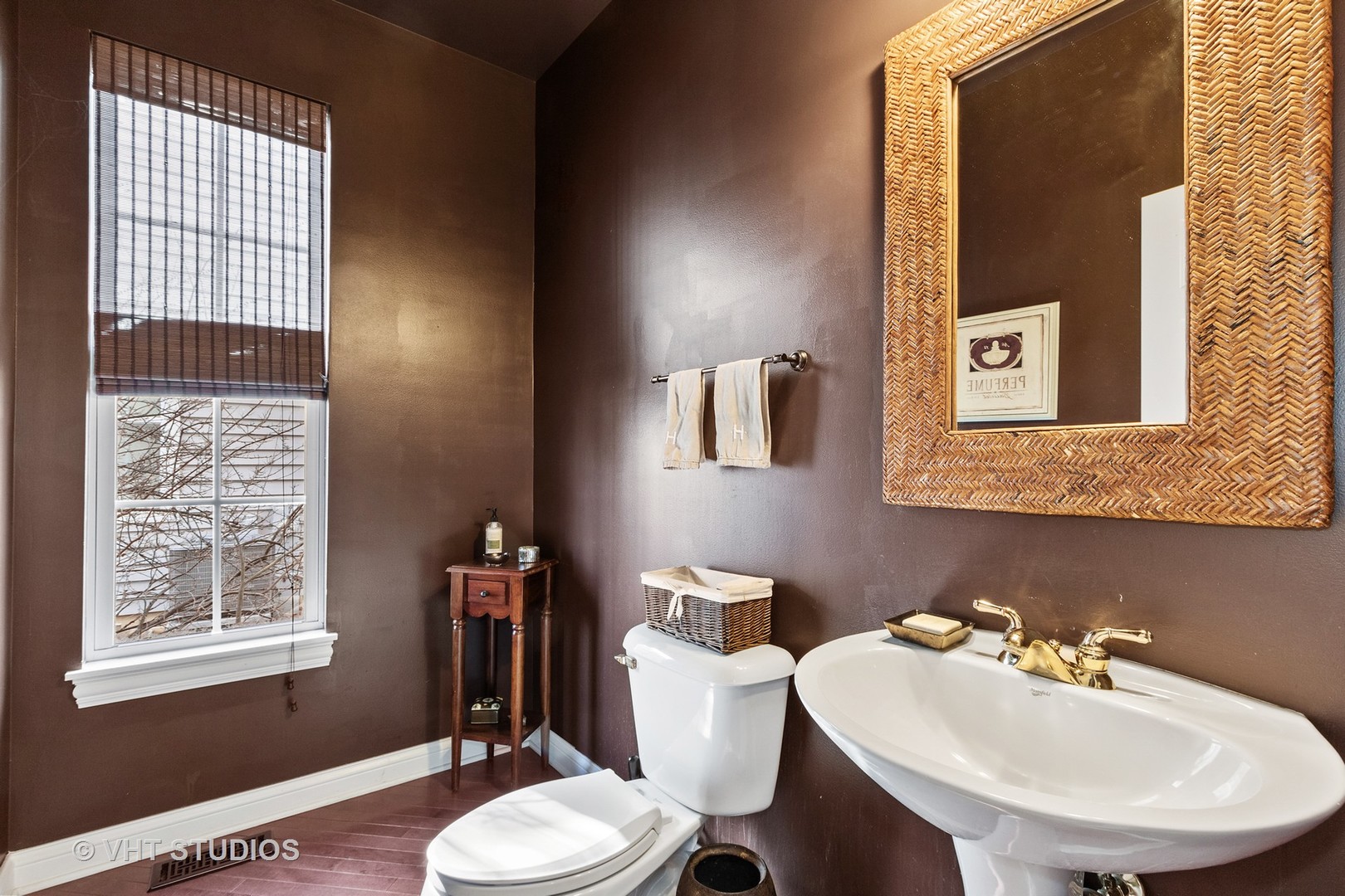 411 Morgan Lane Fox River Grove, IL 60021 - Photo 13 of 37 a bathroom with a sink a toilet and mirror