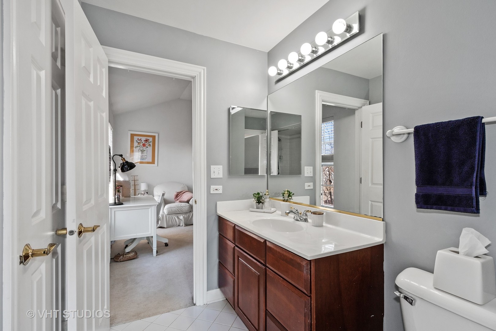 411 Morgan Lane Fox River Grove, IL 60021 - Photo 26 of 37 a bathroom with a sink and a mirror