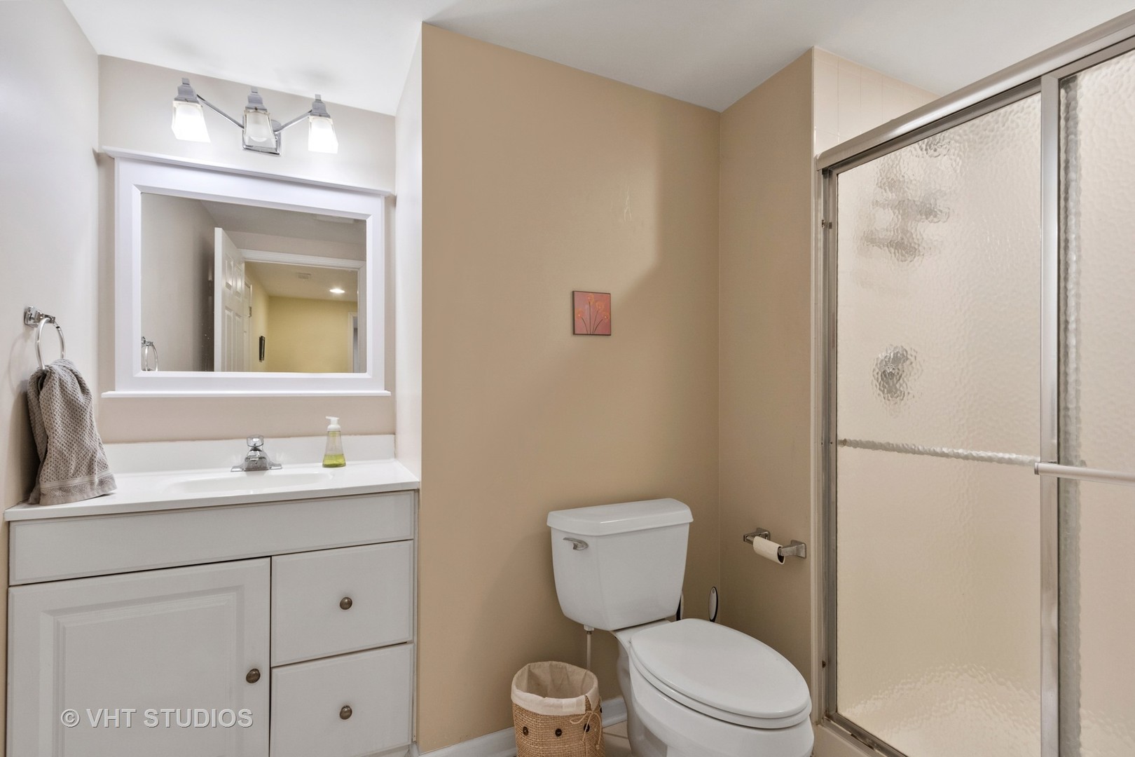 411 Morgan Lane Fox River Grove, IL 60021 - Photo 33 of 37 a bathroom with a toilet a sink and a mirror