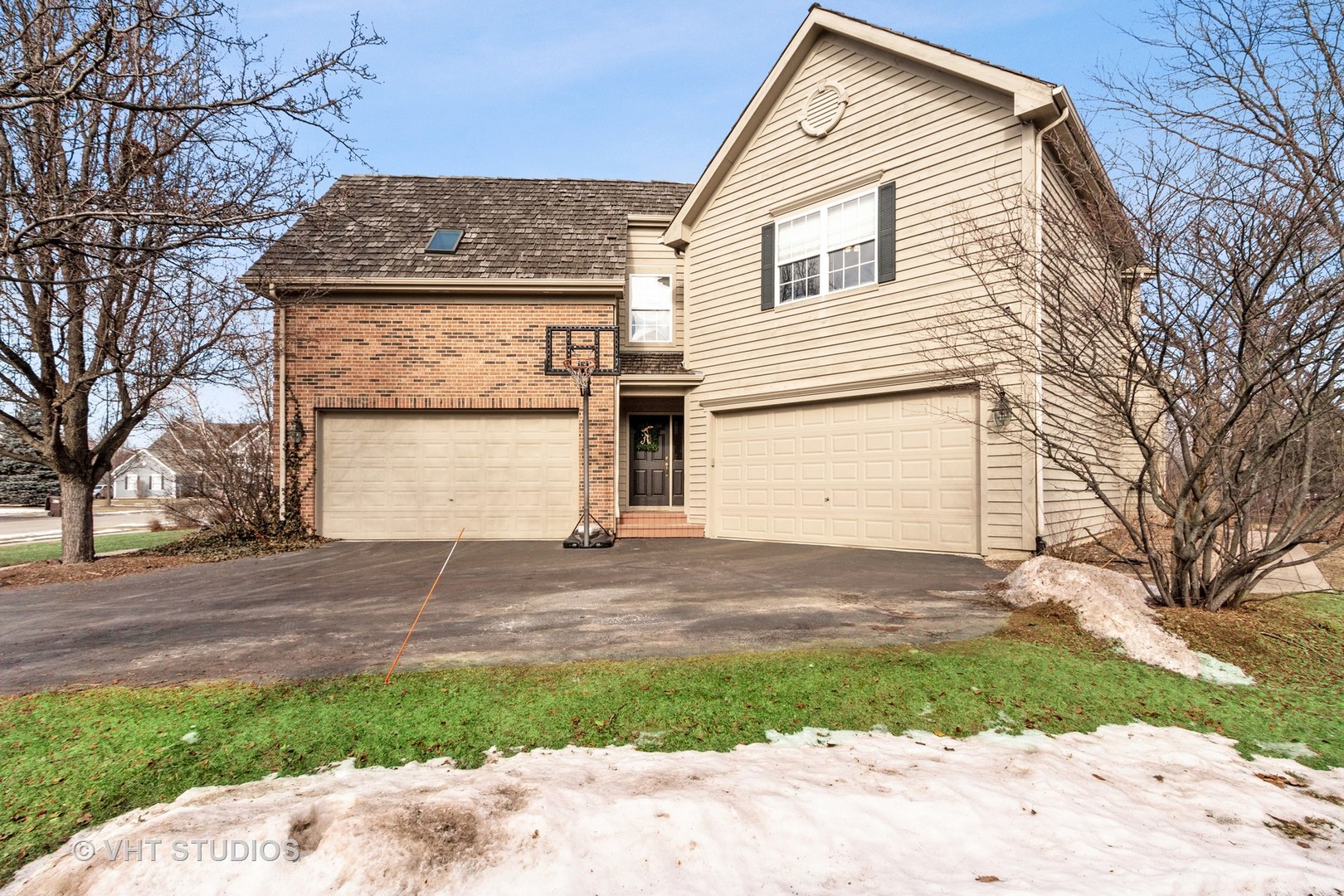 411 Morgan Lane Fox River Grove, IL 60021 - Photo 34 of 37 a front view of a house with a yard and garage