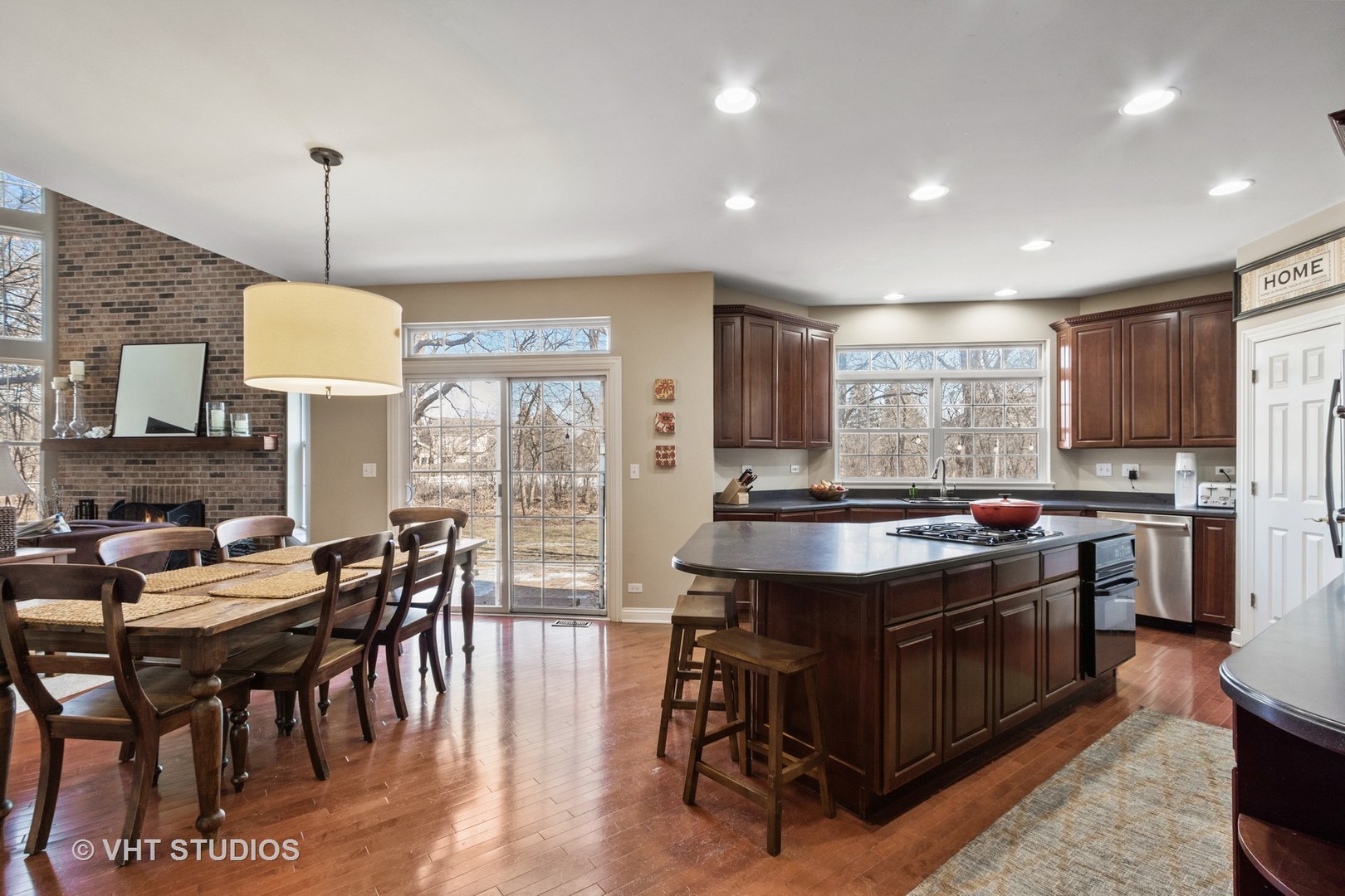 411 Morgan Lane Fox River Grove, IL 60021 - Photo 7 of 37 a kitchen that has a stove and a table