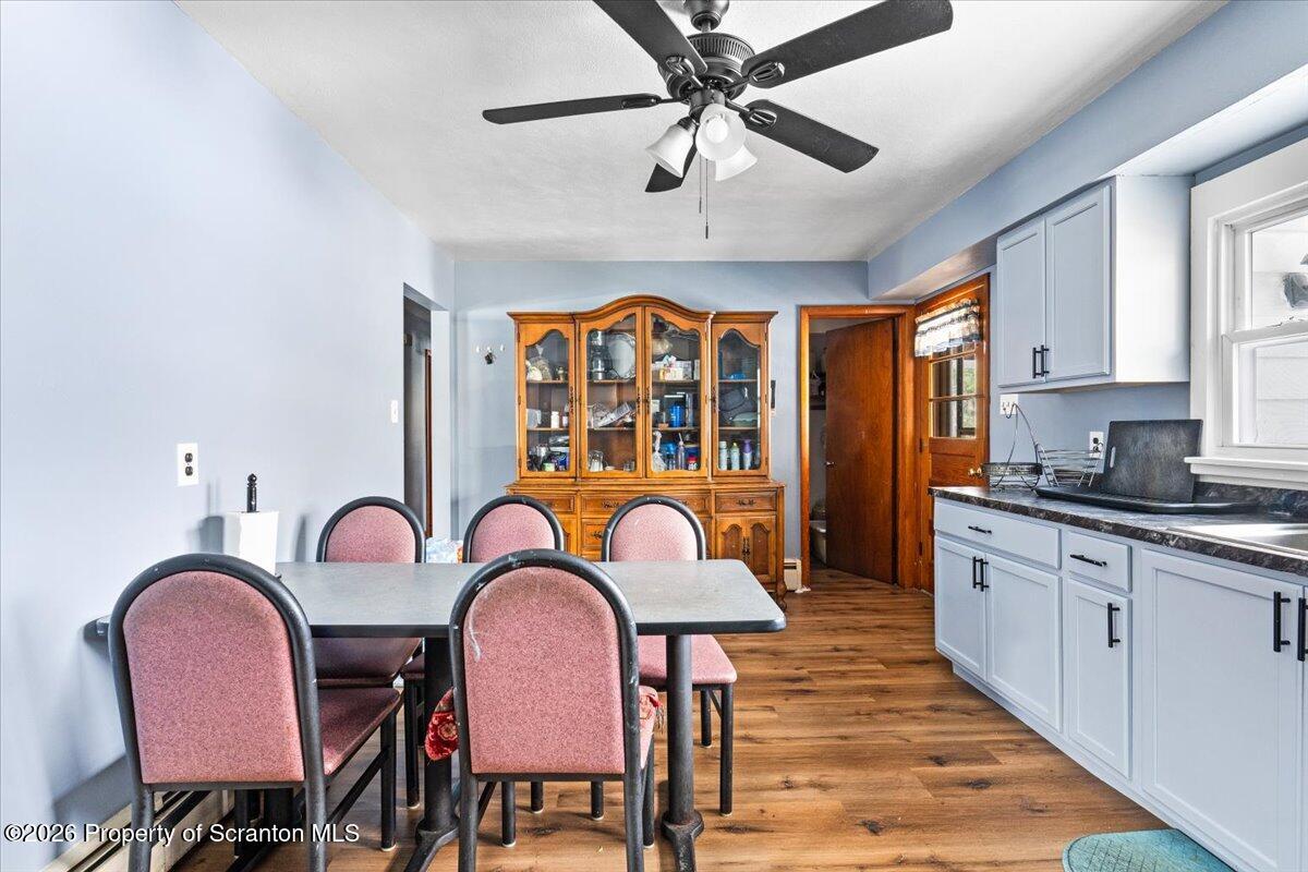 833 Palm Street Scranton, PA 18505 - Photo 11 of 33 a view of a dining room with furniture window and wooden floor