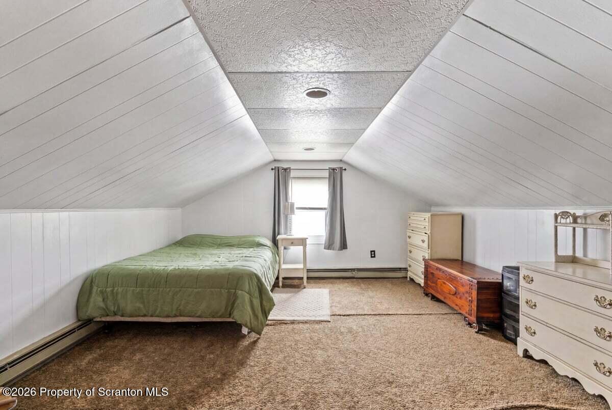 833 Palm Street Scranton, PA 18505 - Photo 21 of 33 a bedroom with a bed and window