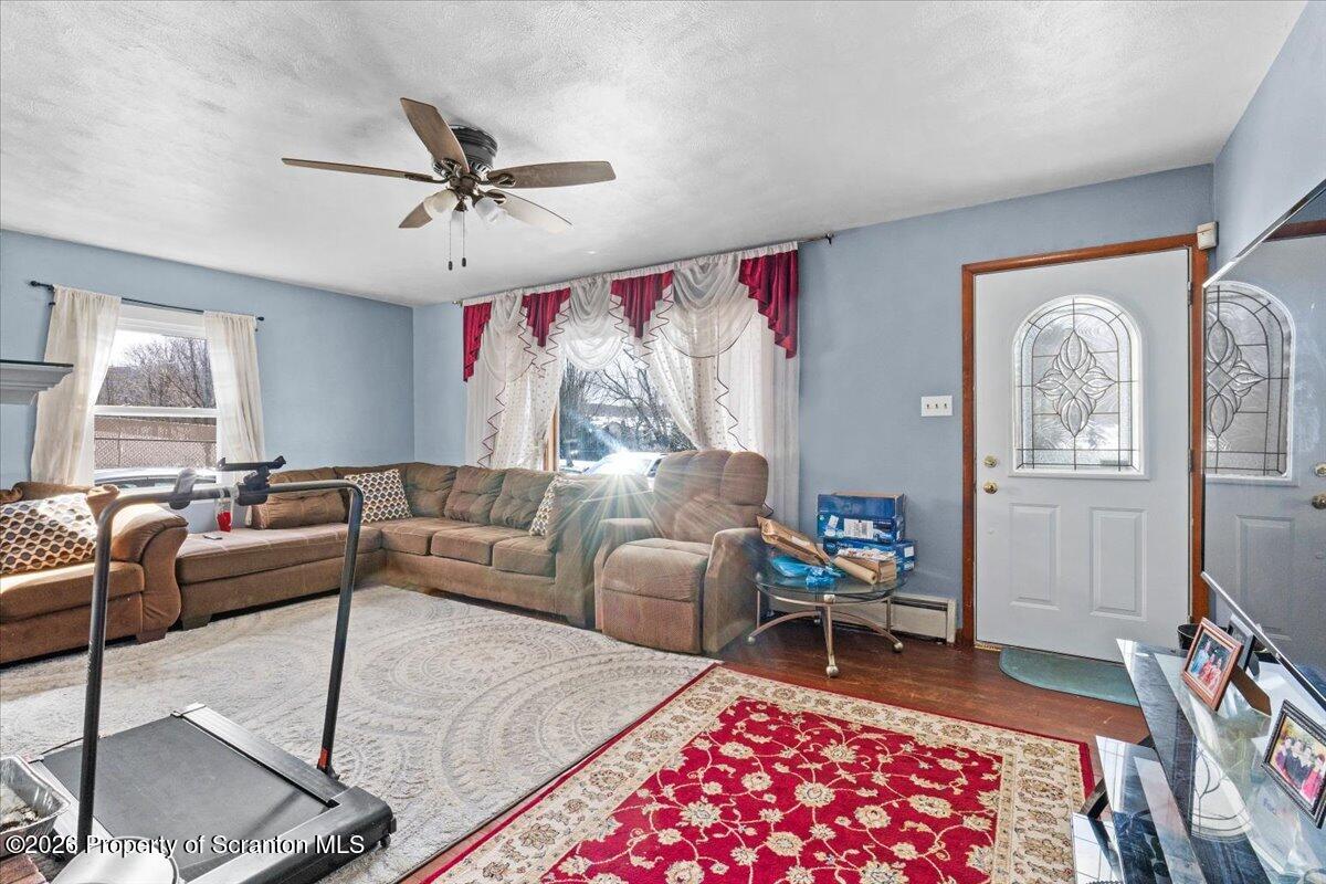 833 Palm Street Scranton, PA 18505 - Photo 8 of 33 a living room with furniture and a window