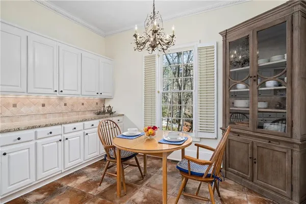 a kitchen with sink and stove