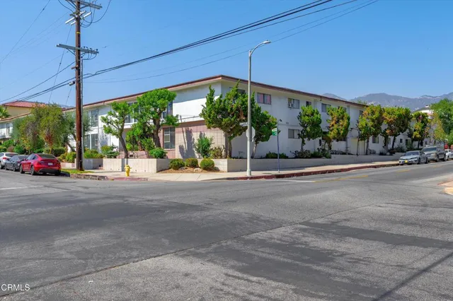 a view of a house with a street from a ceiling window