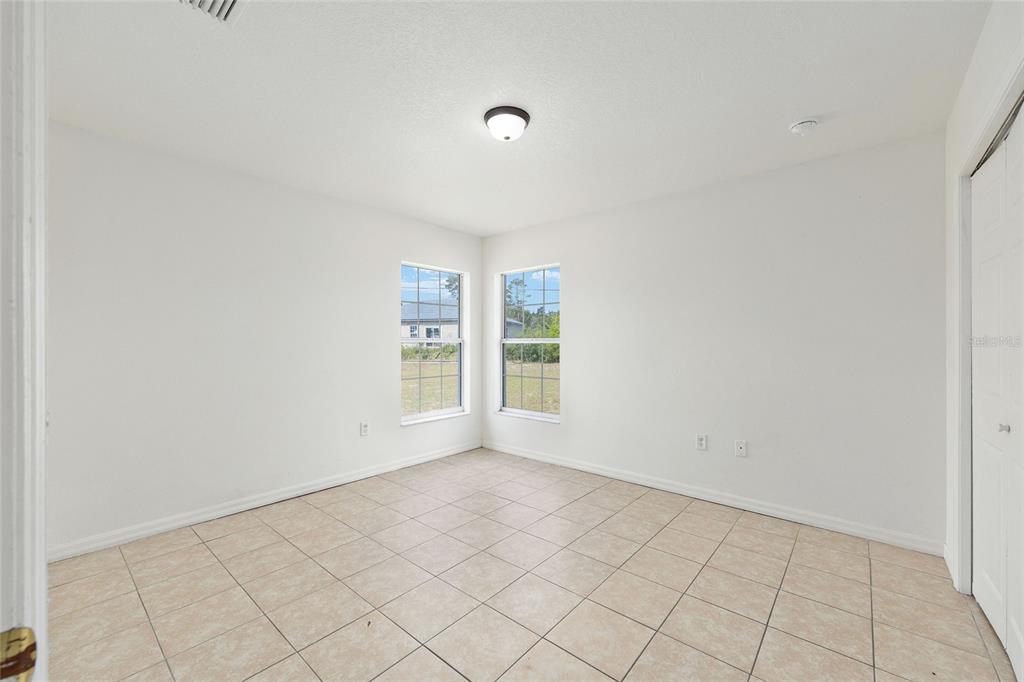 15434 Southwest 23rd Court Road Ocala, FL 34473 - Photo 33 of 41 a view of an empty room with a window