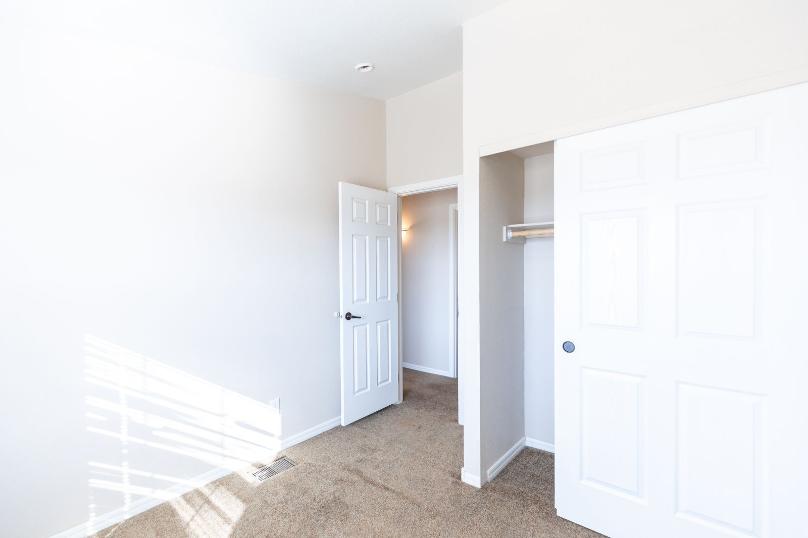 957 East Springer Avenue Ridgecrest, CA 93555 - Photo 15 of 31 a view of a hallway with closet