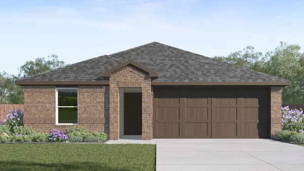 a front view of house with a garden