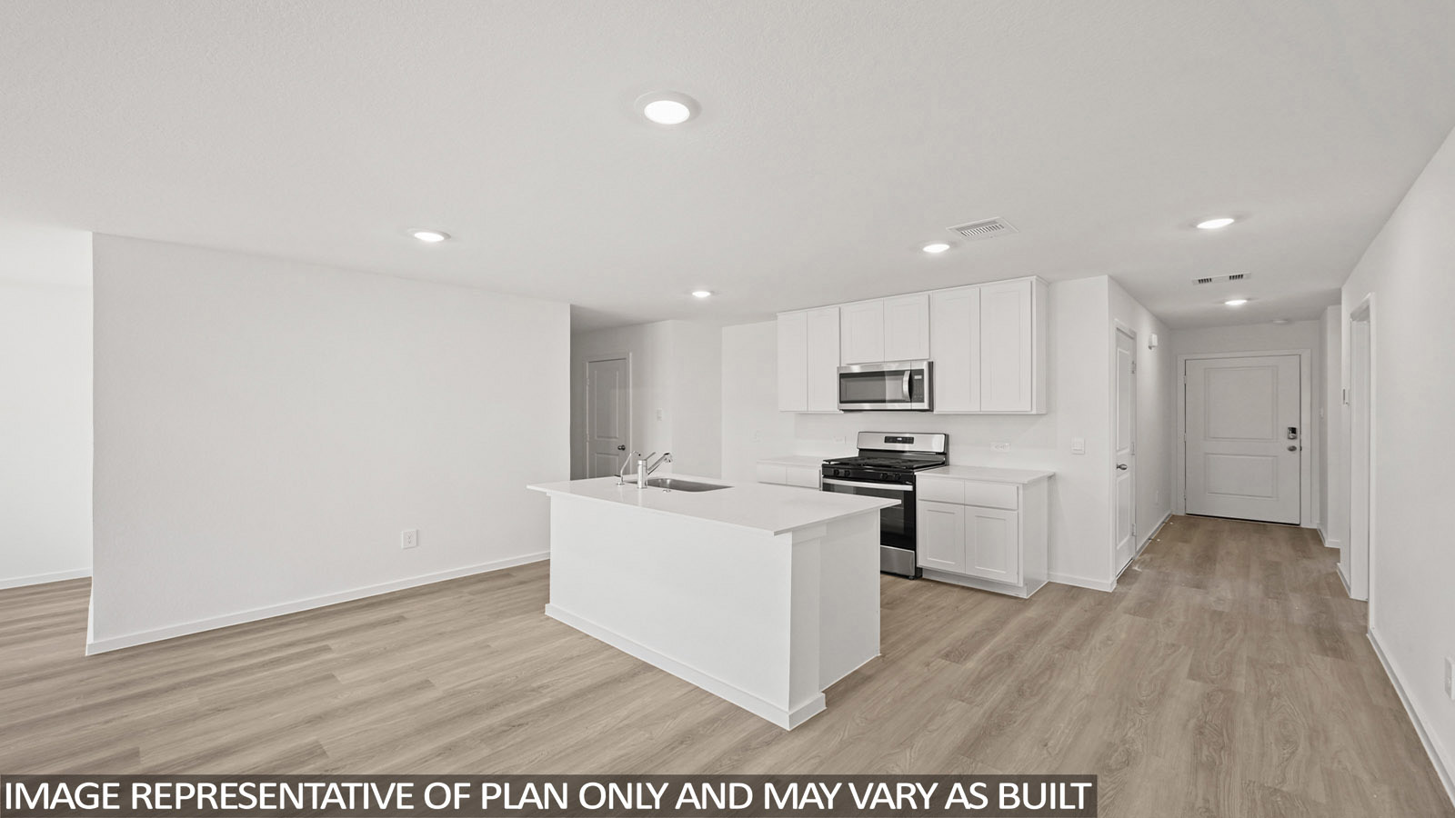 177 Baby Calf Roping Road Jarrell, TX 76537 - Photo 2 of 23 a kitchen with stainless steel appliances kitchen island granite countertop a stove top oven a sink and a refrigerator