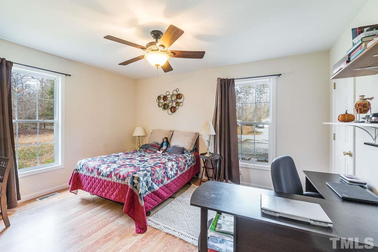 5712 Novaglen Road Durham, NC 27712 - Photo 15 of 27 Secondary bedroom is a comfortable space for schoolwork, and has lots of natural light!