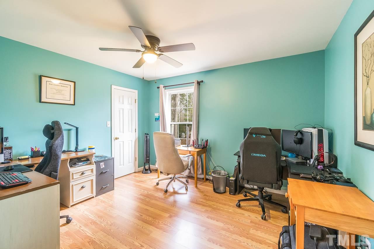 5712 Novaglen Road Durham, NC 27712 - Photo 17 of 27 Bedroom #3 currently accommodates multiple work-at-home office spaces!