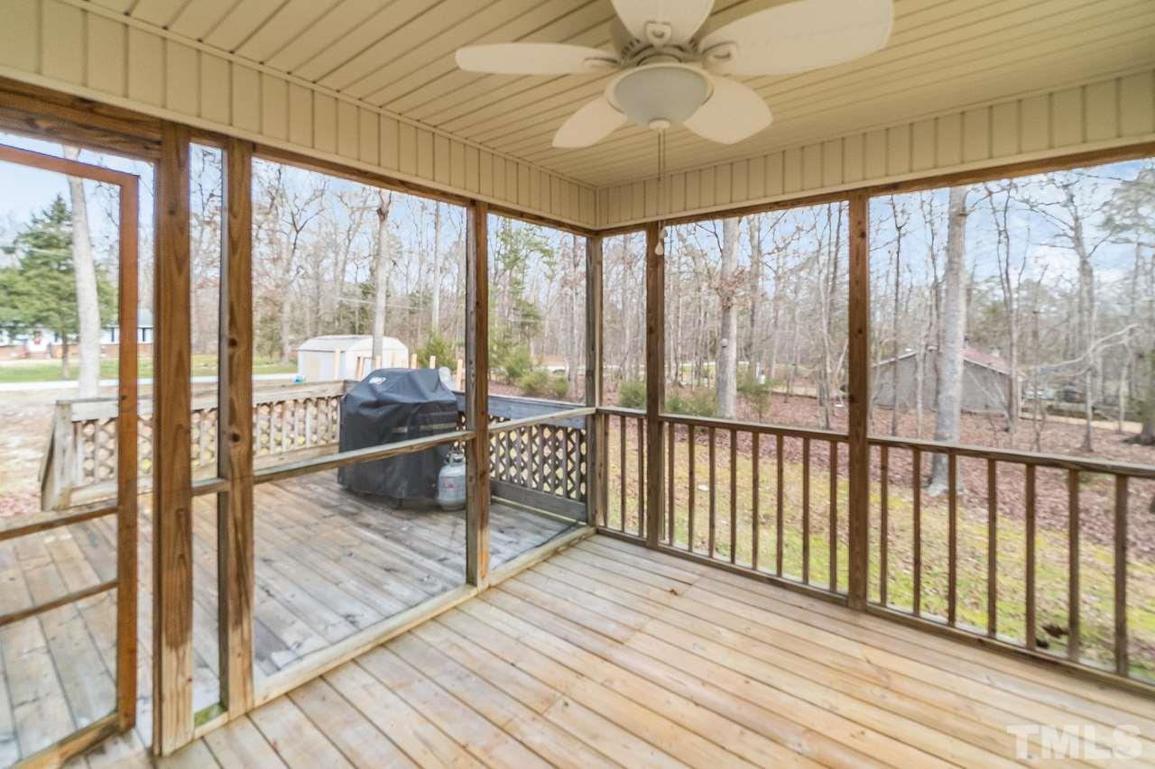5712 Novaglen Road Durham, NC 27712 - Photo 20 of 27 Screened back porch connects you with your backyard oasis!