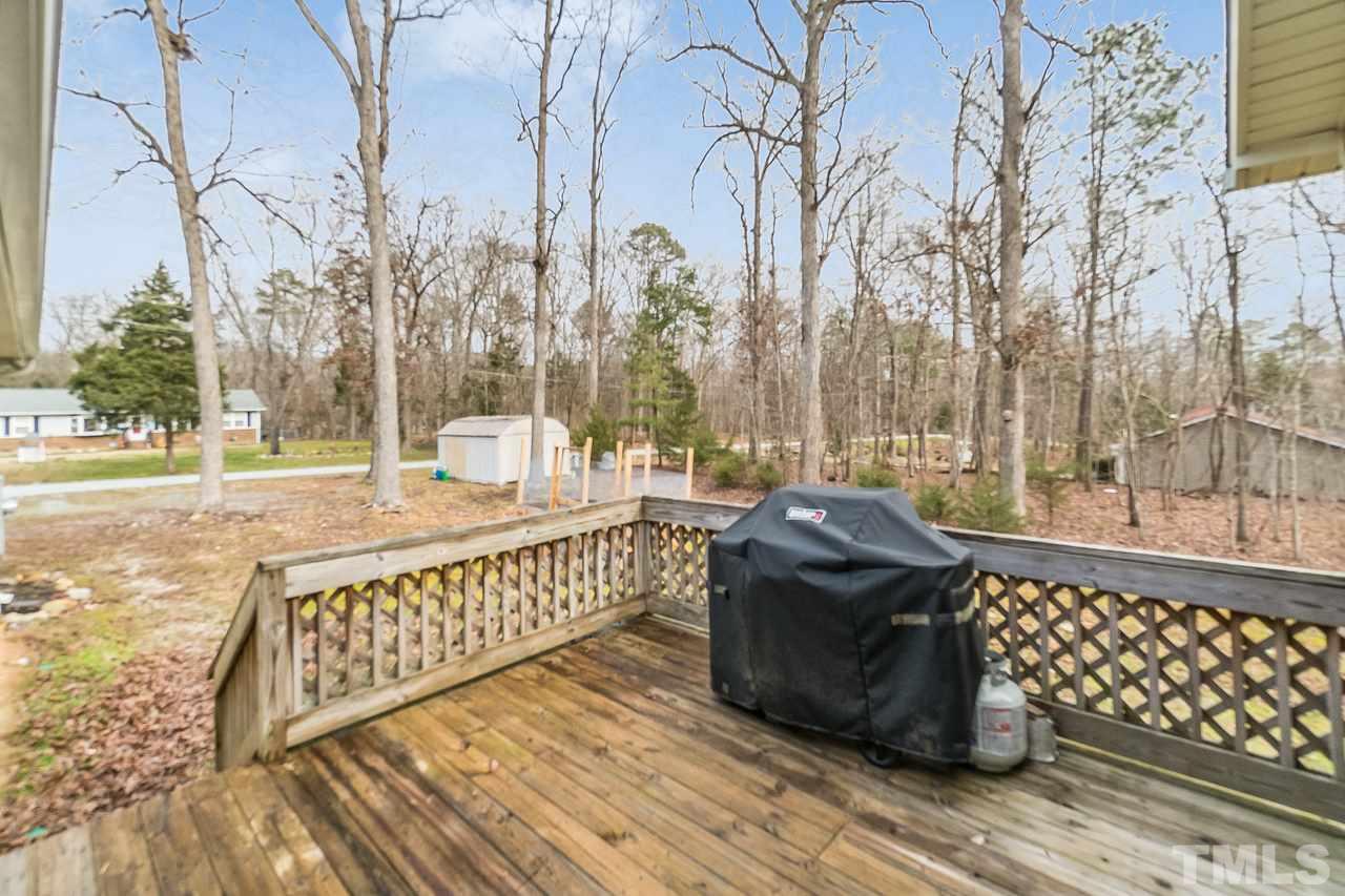 5712 Novaglen Road Durham, NC 27712 - Photo 21 of 27 Back deck for grilling and enjoying the scenery!