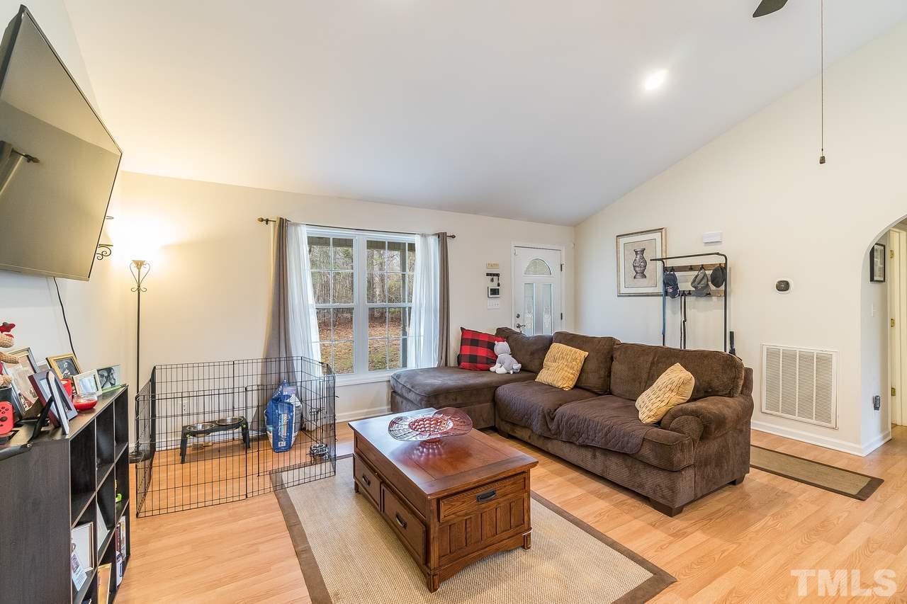 Spacious living room with vaulted ceilings!